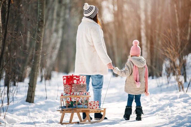 Quiet winter walk with a parent and child, symbolising mental well-being over Christmas
